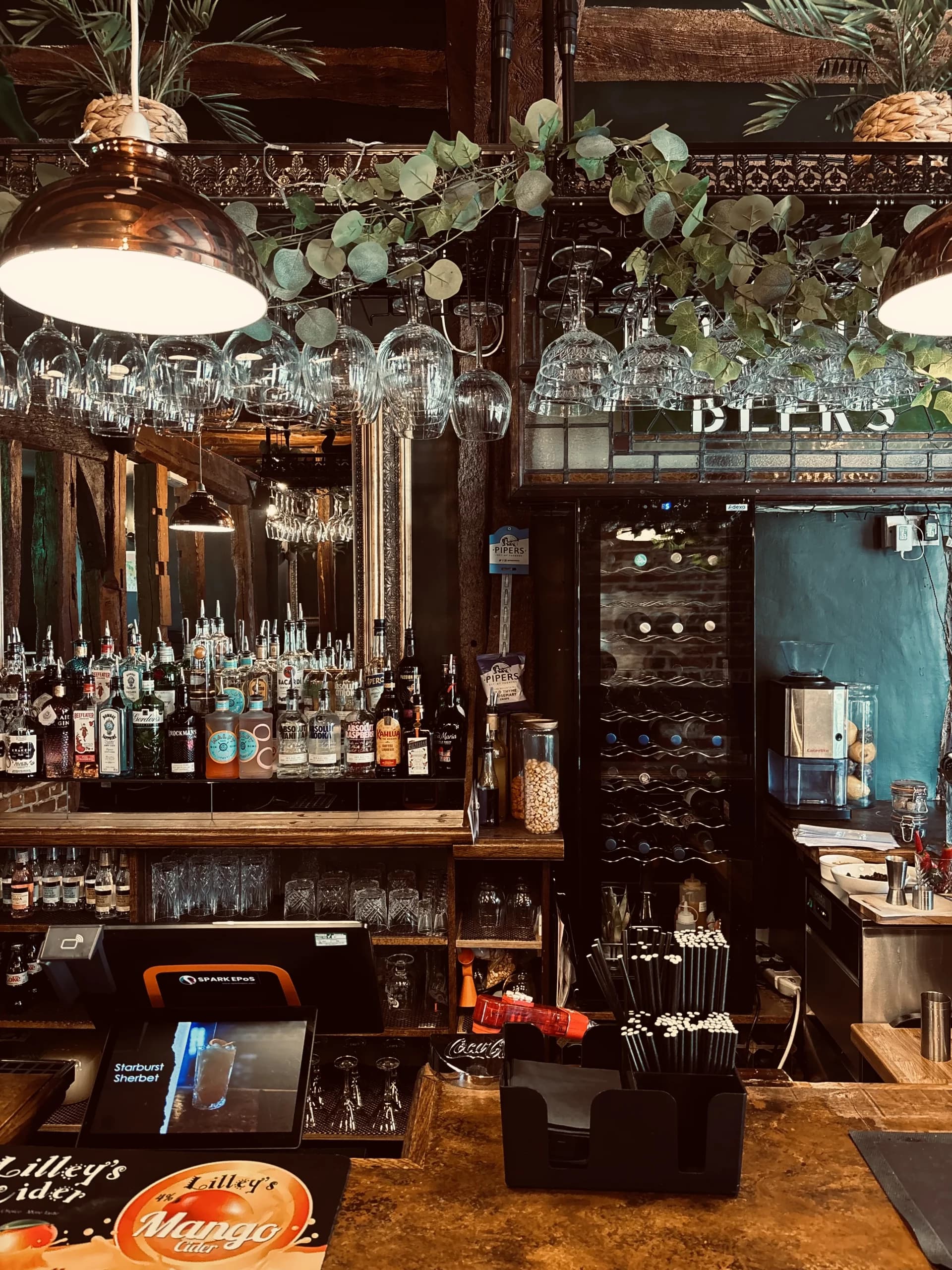 Guests enjoying drinks at The Limes bar